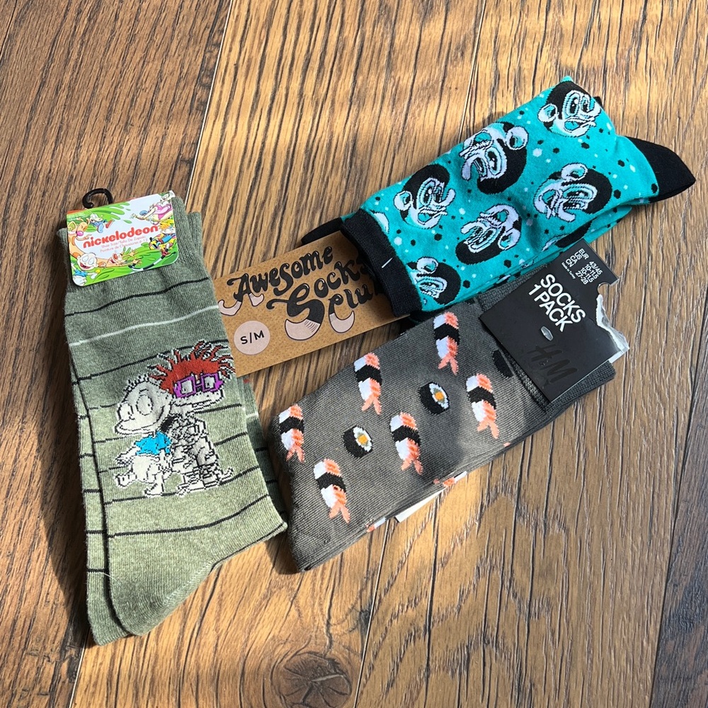 Bundle of 3 brand new socks. Rugrats, Sushi, Fun Uncle Frank